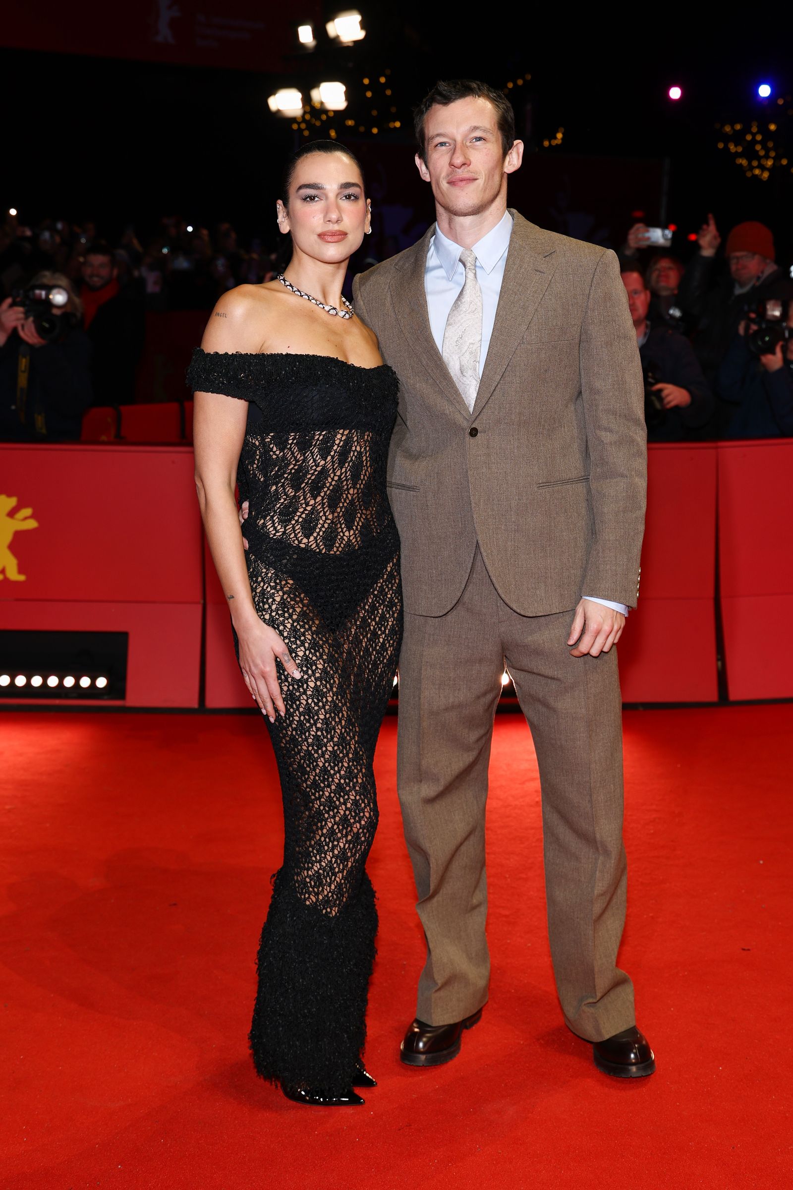 Dua Lipa and Callum Turner attend the Rosebush Pruning premiere during the 76th Berlinale International Film Festival...