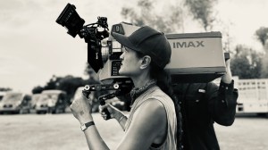 Black and white photo of cinematographer Autumn Durald Arkapaw with IMAX camera on 'Sinners'