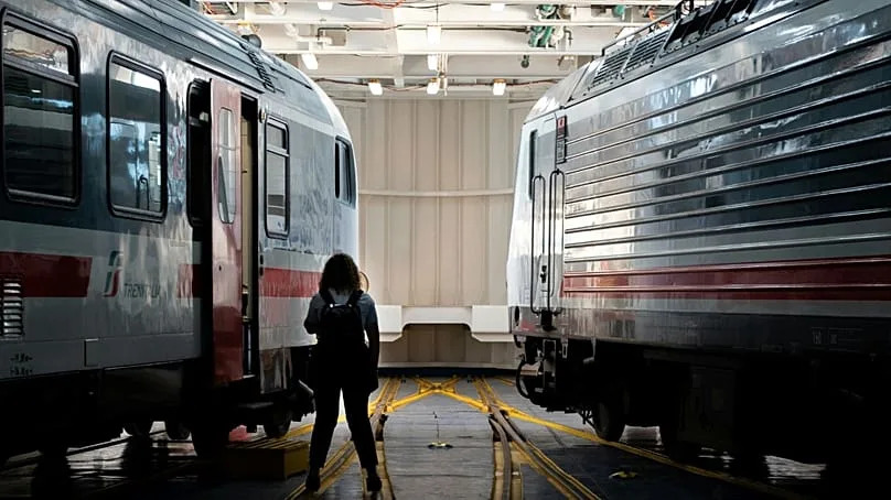 Trenitalia trains board a special ferry on the journey to Sicily