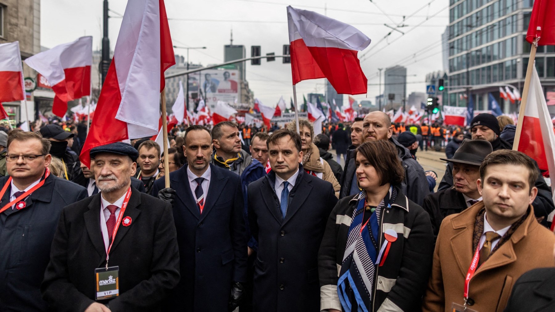 Polish Justice Minister Zbigniew Ziobro (C) attends the country's Independence Day march organised by patriotic groups in Warsaw on November 11, 2022.