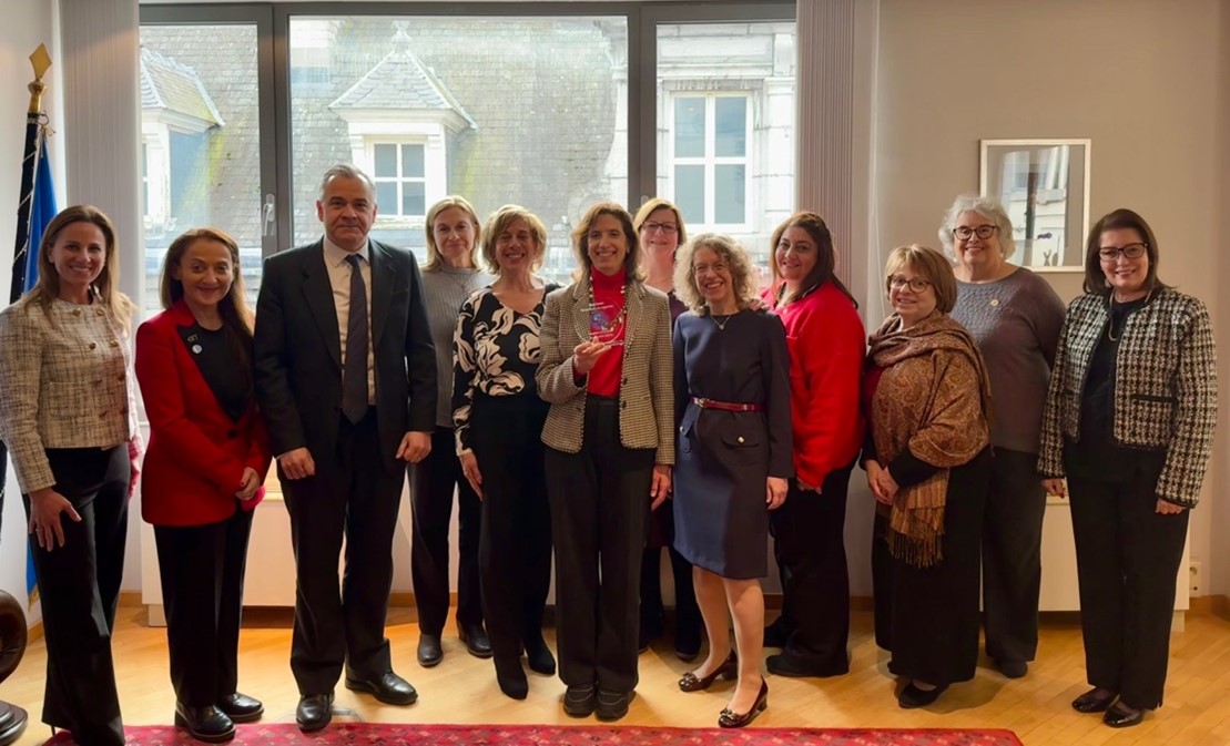 Left to Right: Daughters of Penelope Executive Director Elena Saviolakis, Region Governor of Europe and Australia Athanasia Vassiliadou, First Counselor of the Greek Embassy in Belgium Mr. Dimitrios Velissaroulis, Grand Secretary Patty Didik, Grand President Antoinette Marousis Zachariades, Her Excellency the Ambassador of Greece to Belgium Ms. Sofia Grammata, Grand Vice President Gretchen Holtsinger, Thetis Brussels Chapter President Eleni Maglara, Grand Treasurer Effie Kirkiles, Past Grand President Demi Thomas, DOP Foundation, Inc. President Robbie Jackson, and Region Governor of Cyprus Margaret Pitiris.