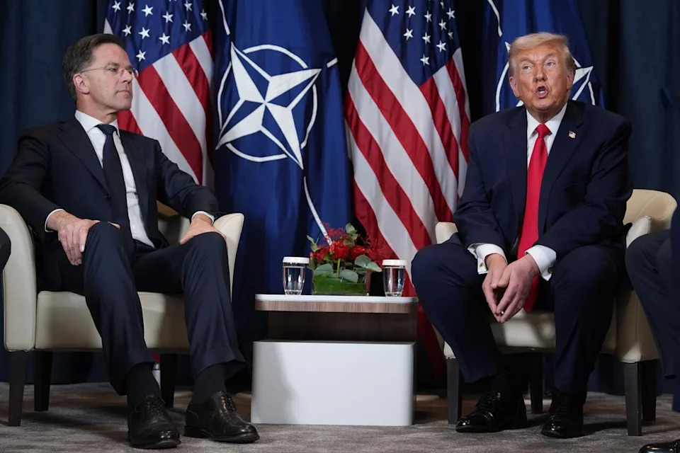 President Donald Trump, right, meets with NATO Secretary General Mark Rutte during a meeting on the sidelines of the Annual Meeting of the World Economic Forum in Davos, Switzerland, Wednesday, Jan. 21, 2026. (AP Photo/Evan Vucci)