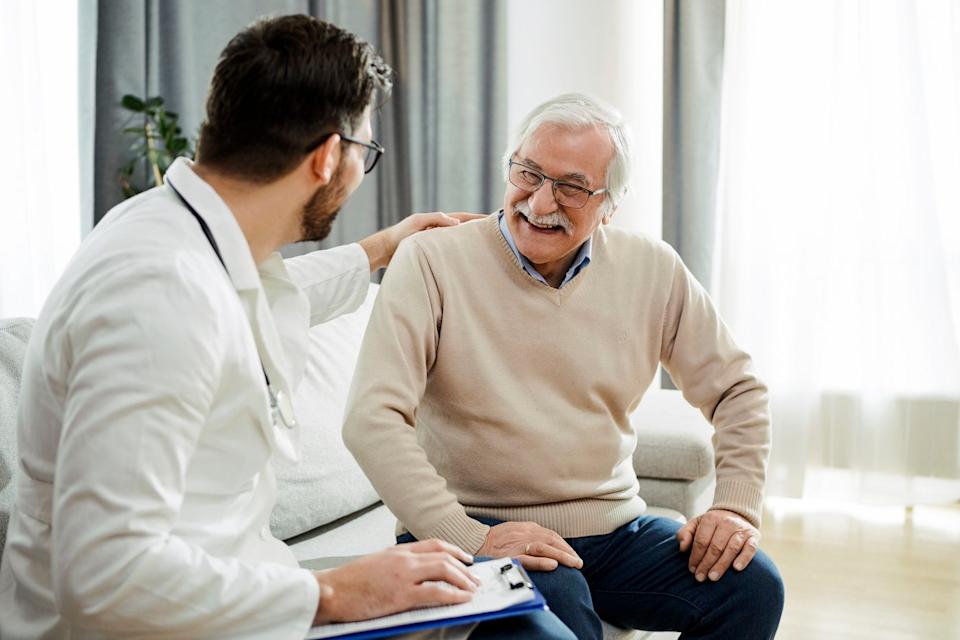 Physician talking to patient. 