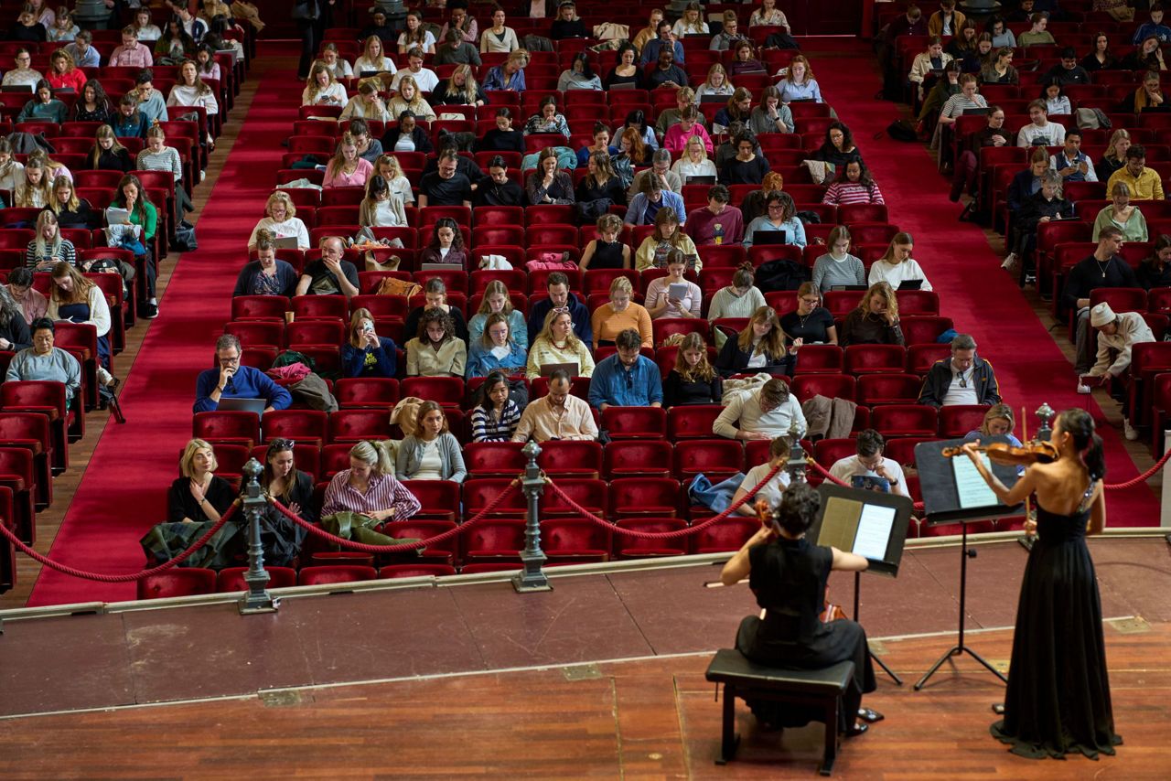 Students cram in Amsterdam’s Concertgebouw as musicians play