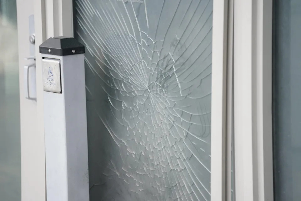 Damages at the U.S. Embassy after a loud bang was reported at the site, in Oslo, Norway, March 8, 2026. / Credit: NTB/Fredrik Varfjell/via REUTERS