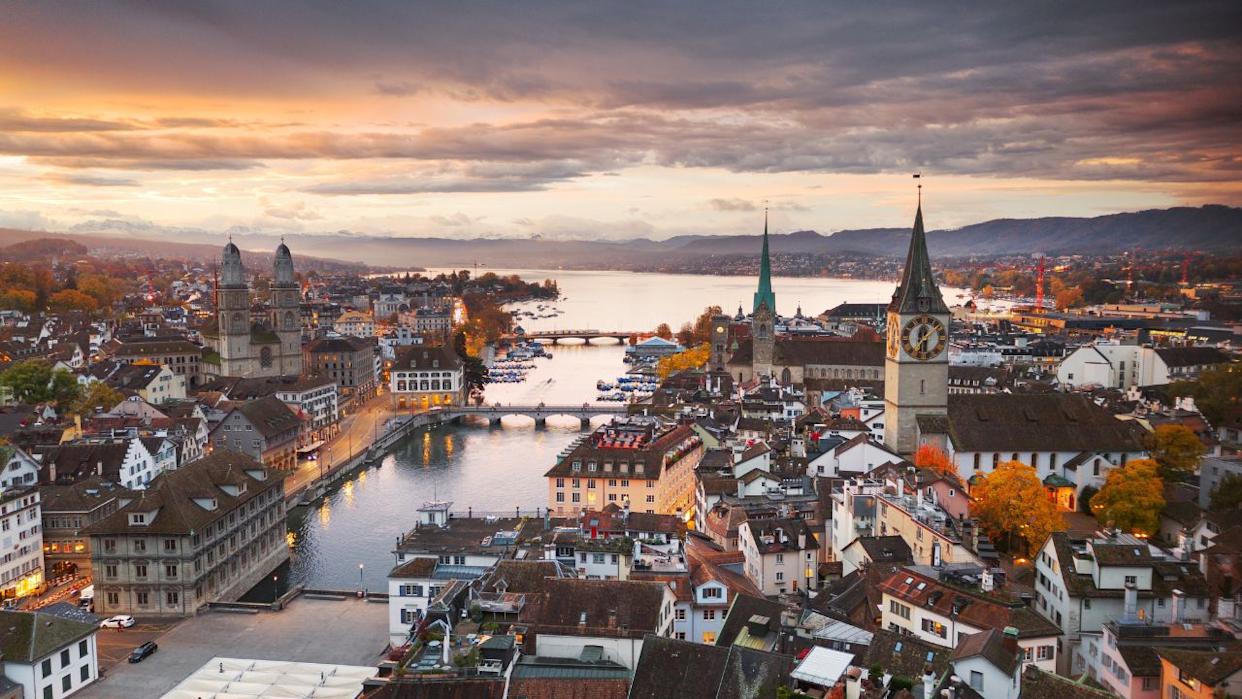 Zurich, Switzerland old town skyline over the Limmat River on an autumn morning.