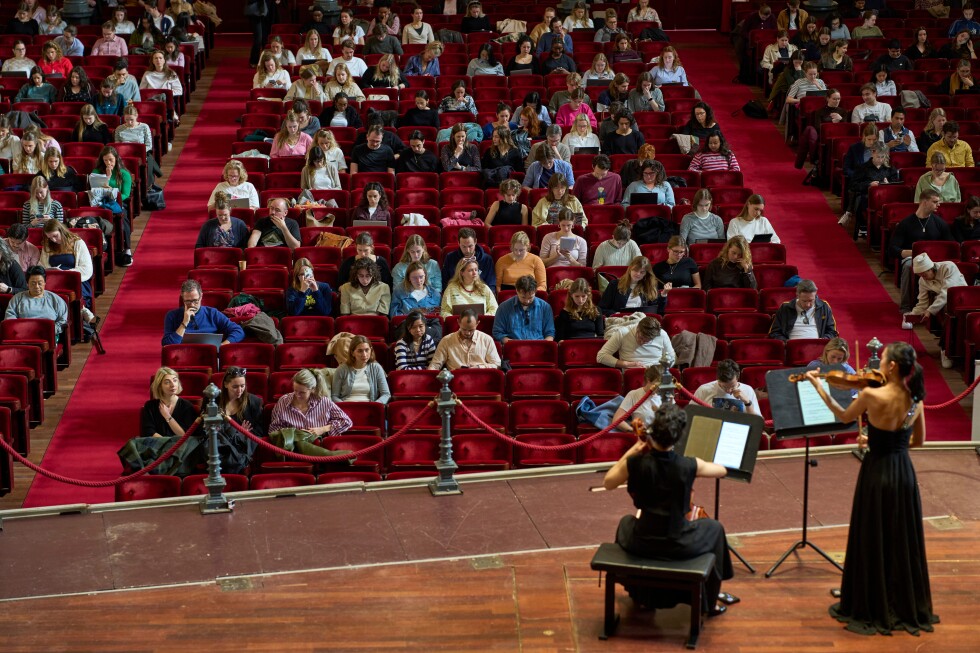 Students study to classical music at Amsterdam's historic concert hall