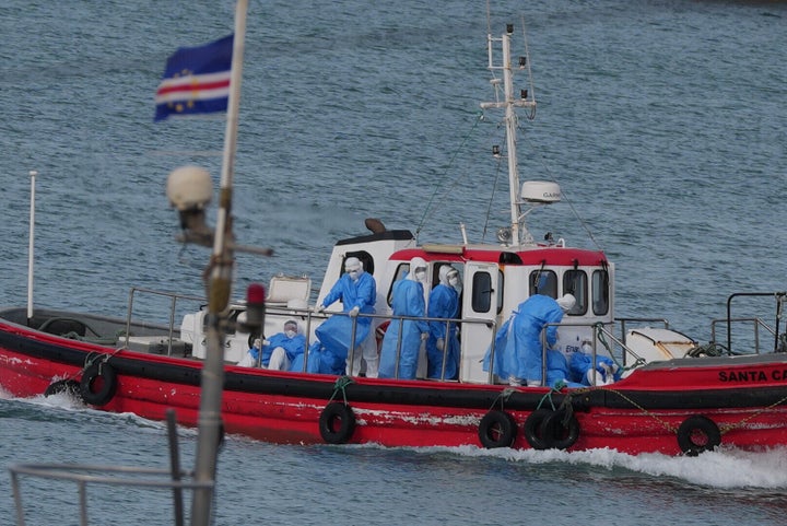 Medical professionals transport patients believed to be infected with hantavirus.