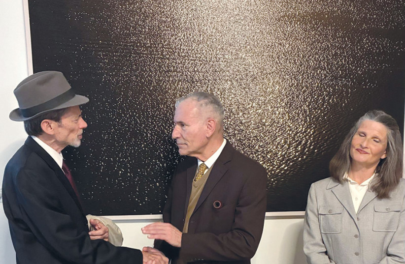 Heisenberg, played by David Golinkin (L), is greeted by Niels Bohr, played by Yehoshua Looks, with Bohr’s wife, Margarethe, played by Miriam Metzinger.