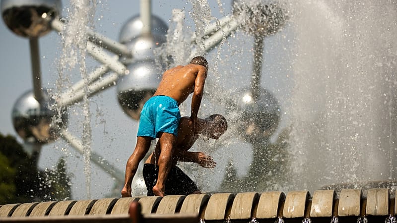 Brussels residents cool off in fountains as heatwave grips Belgium