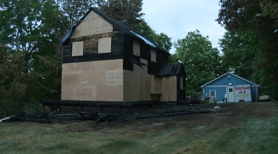 Two people rescued, two cats killed in Berlin house fire