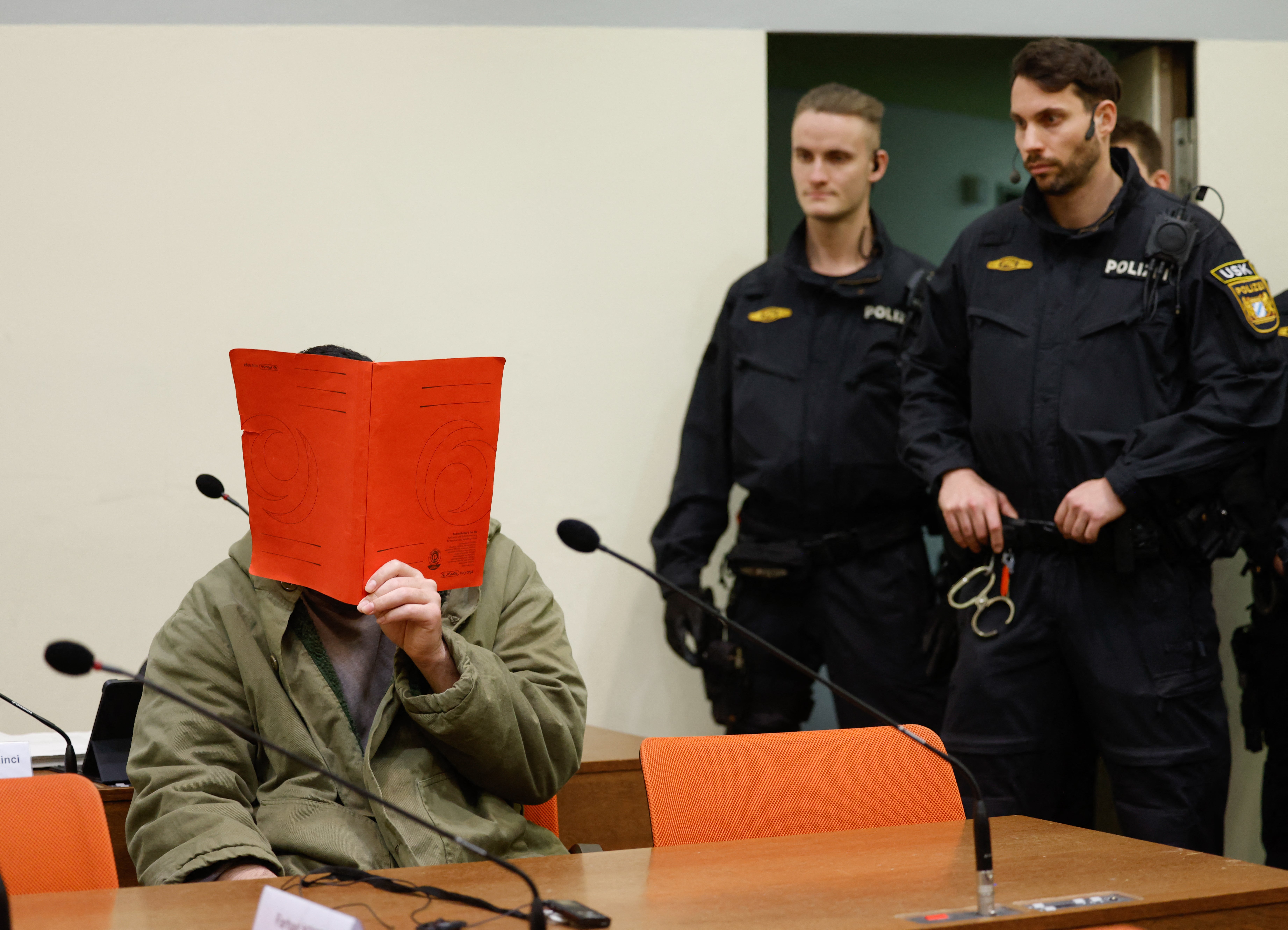 A defendant, identified as Farhad N, at the start of his trial for the 2025 Munich attack