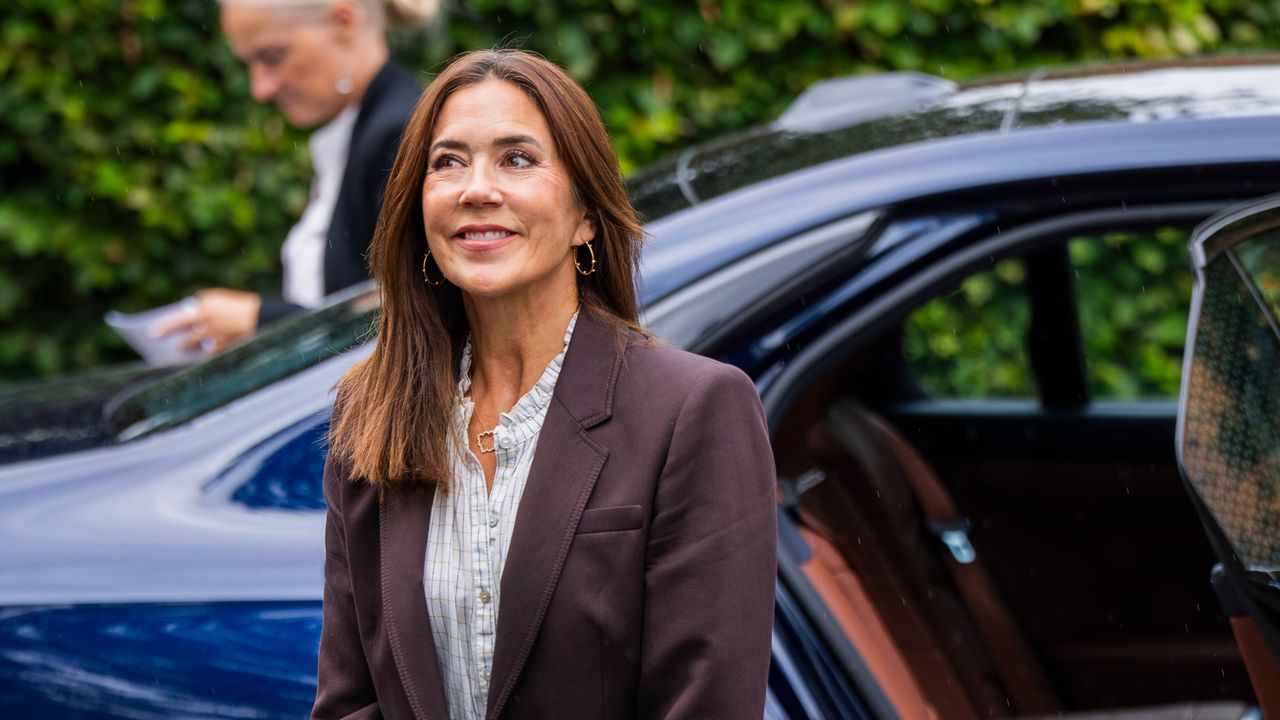 Queen Mary of Denmark masters casual dressing in wide-leg jeans as she returns to work after her summer break