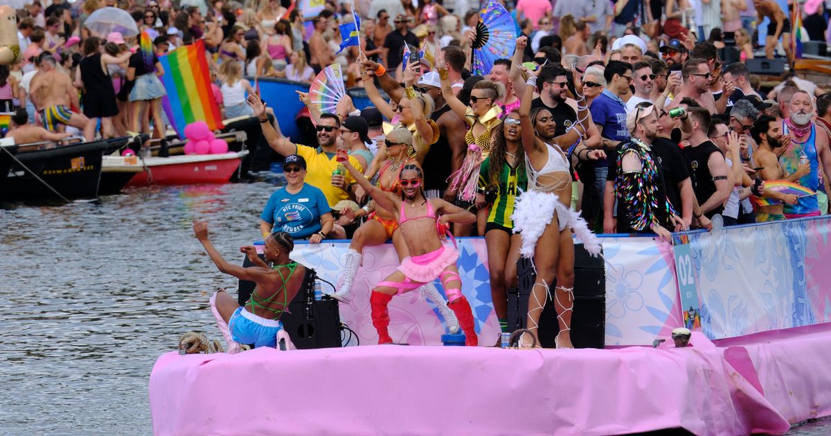 Hundreds of thousands line Amsterdam canals for the annual Pride boat parade :: WRAL.com