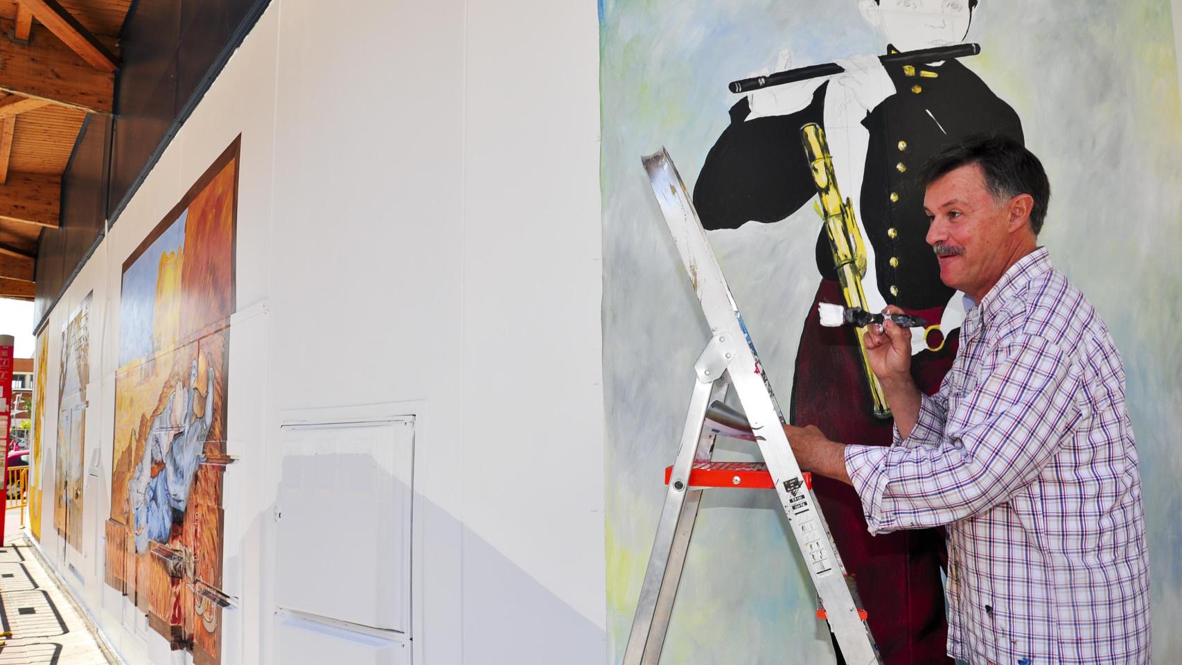 Manuel Ojeda pintando el mural de la estación de autobuses de Torrejón de Ardoz en 2011.