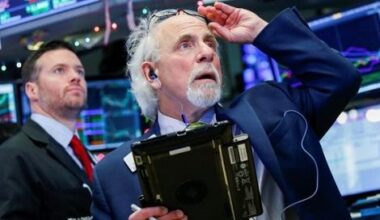 Dow Jones sube e intenta salvar la semana a la espera de Powell