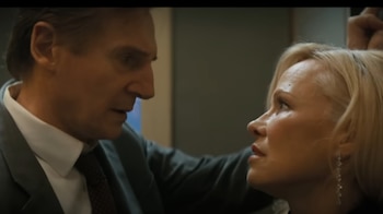 Liam Neeson y Pamela Anderson