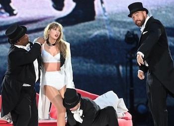 Taylor Swift junto a Travis