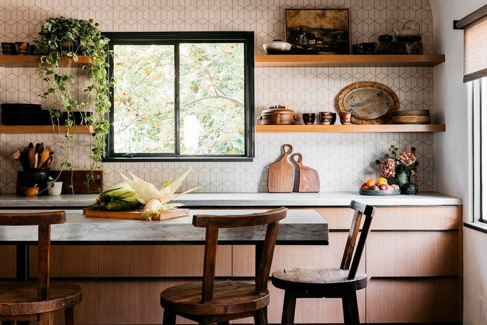 cozy kitchen interior with wooden furniture and decorative plants