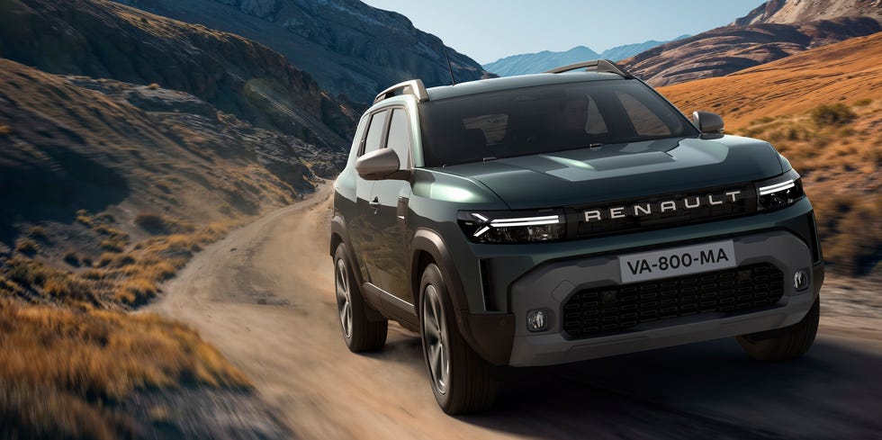 a renault vehicle driving on a rugged mountain road