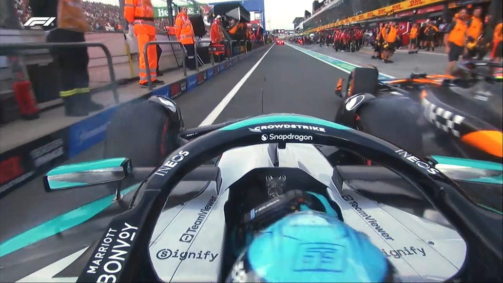 formula 1 race car in the pit lane during a race