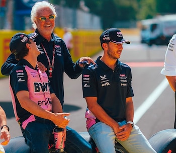 Flavio Briatore junto a sus