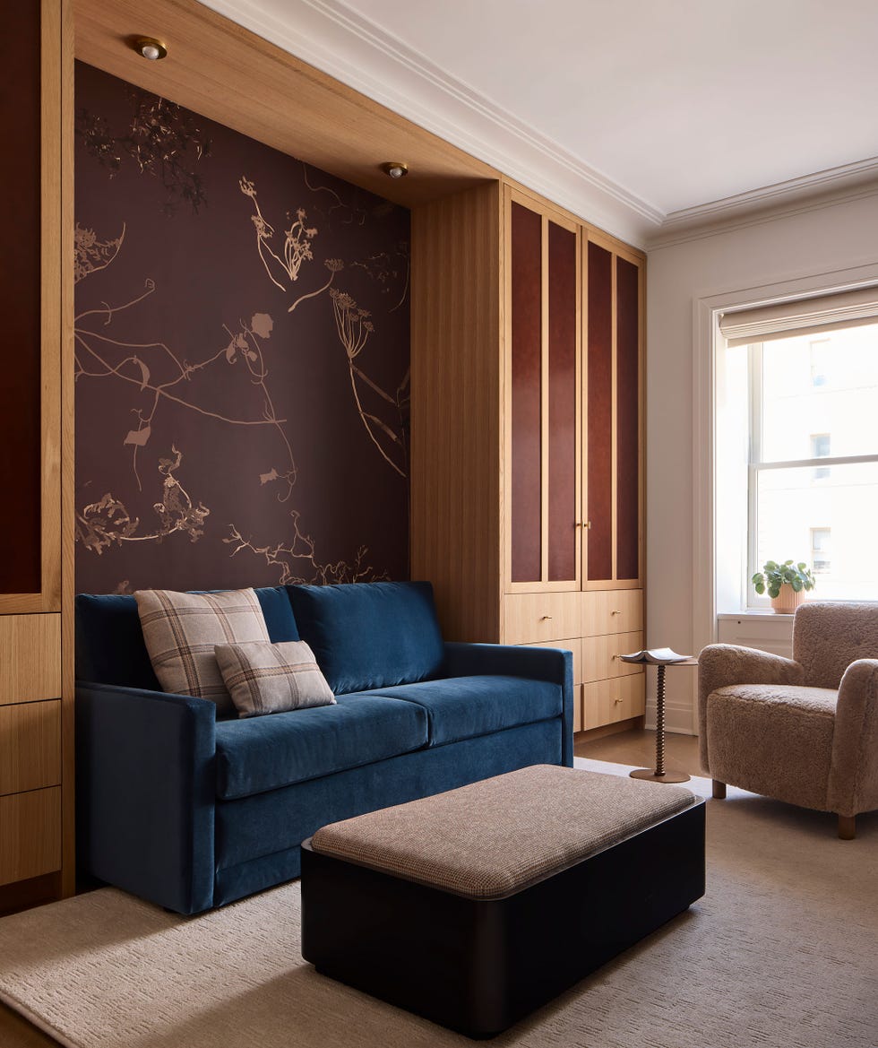 Living room with modern furnishings and decor elements.