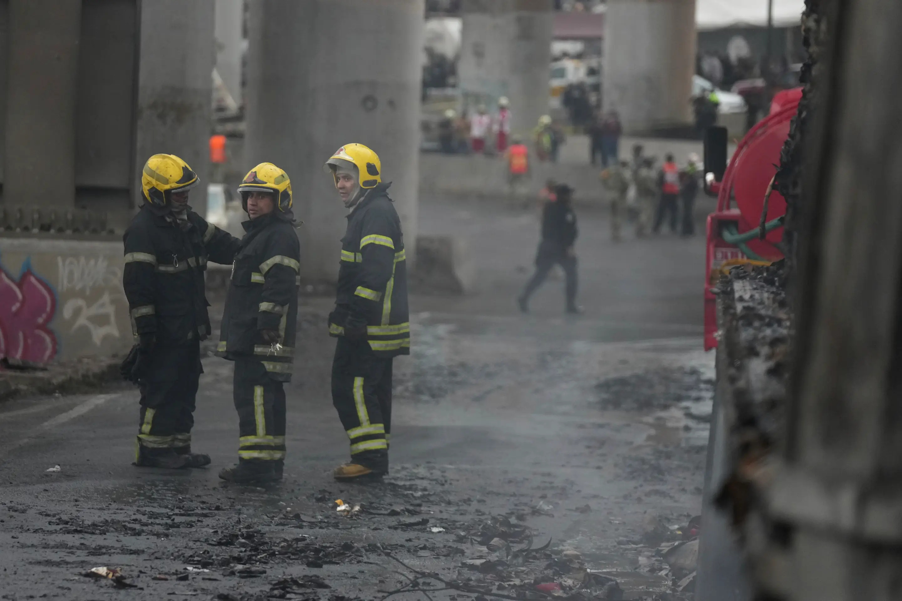 Firefighters work the scene following a gas tank explosion in Mexico City, Wednesday, Sept. 10, 2025. (AP Photo/Fernando Llano)