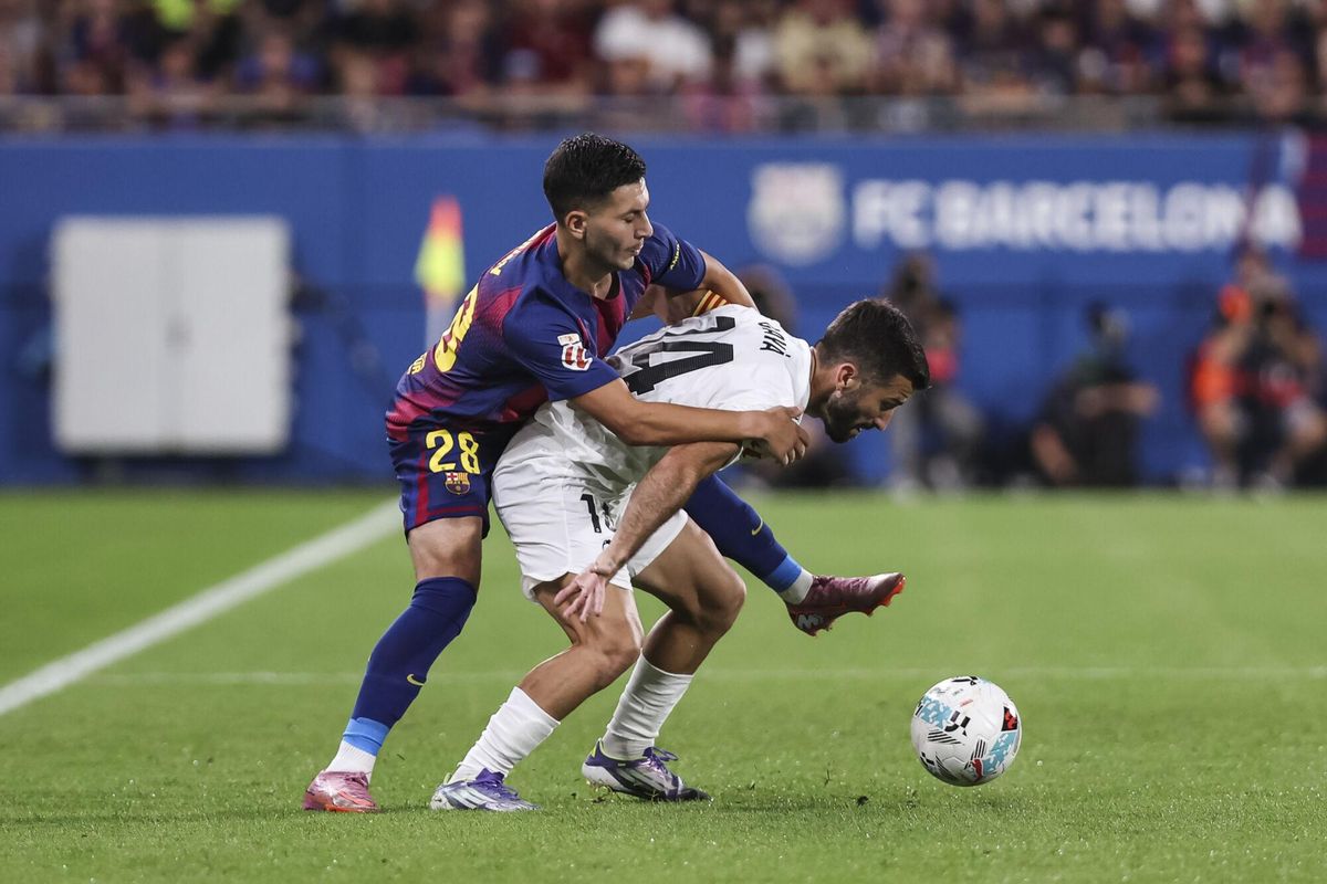 Roony Bardghji of FC Barcelona and Jose Gaya of Valencia CF compete for the ball during the Spanish league, La Liga EA Sports, football match played between FC Barcelona and Valencia CF at Johan Cruyff stadium on September 14, 2025 in Barcelona, Spain. AFP7 14/09/2025 ONLY FOR USE IN SPAIN. Javier Borrego / AFP7 / Europa Press;2025;SPORT;ZSPORT;SOCCER;ZSOCCER;FC Barcelona v Valencia CF - La Liga EA Sports