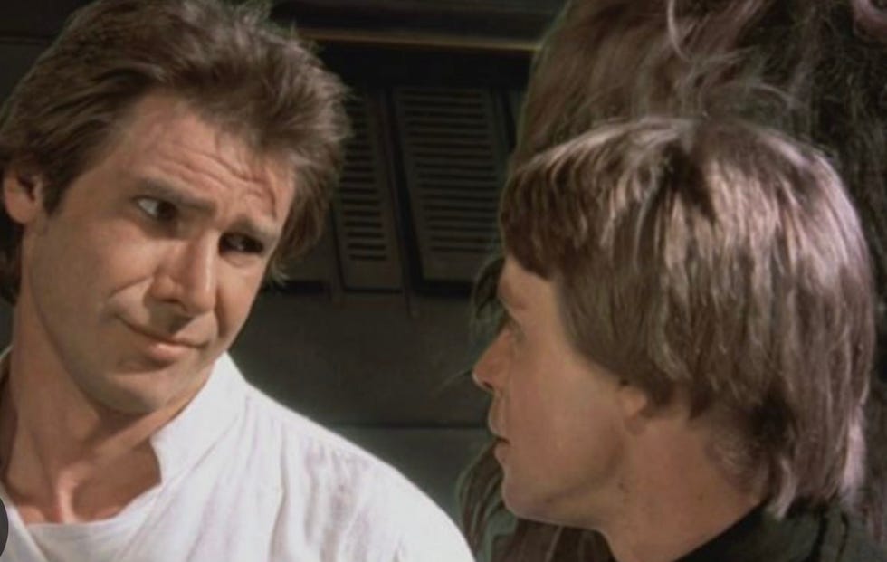 two characters engaged in conversation in a scifi setting