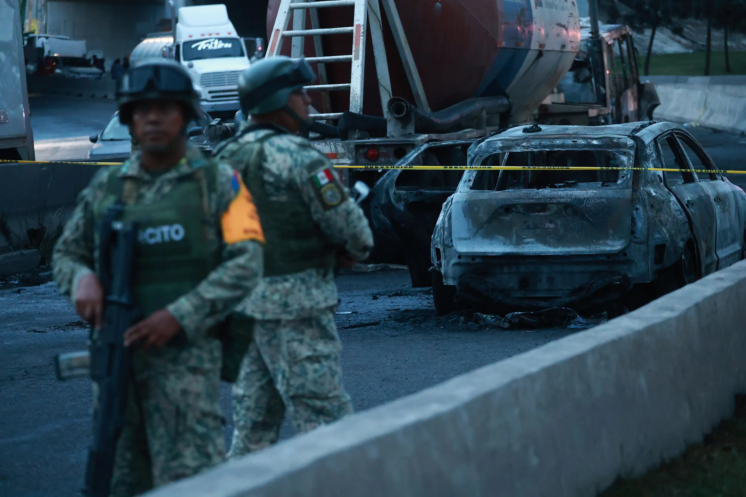 MEXICO CITY, MEXICO - SEPTEMBER 10: Members of the Army stand guard at the site of a massive gas tanker explosion, in Mexico City, Mexico on September 10, 2025. The explosion left at least 70 people injured and 3 killed, authorities reported. (Photo by Daniel Cardenas/Anadolu via Getty Images)