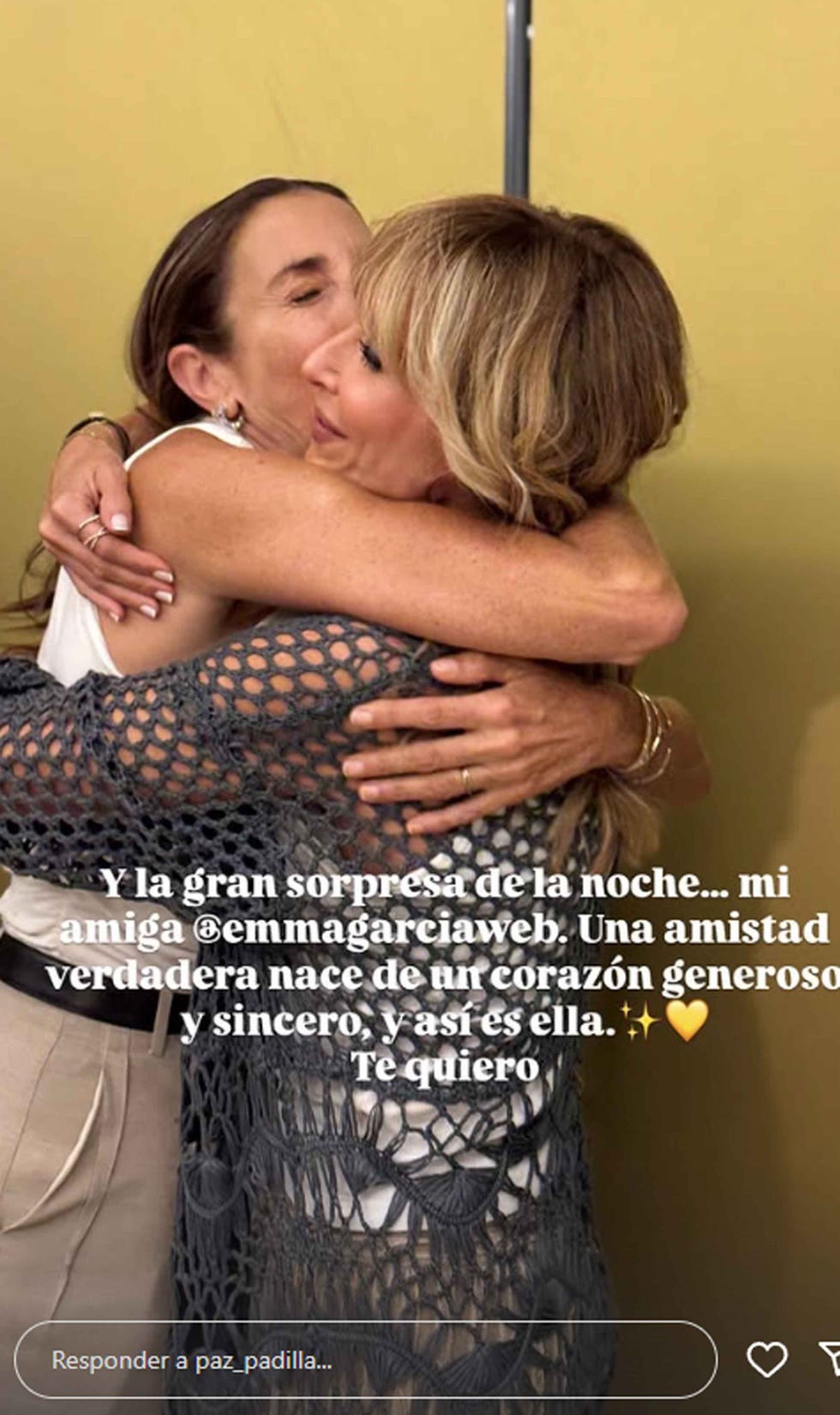 two women embracing in a warm gesture of friendship