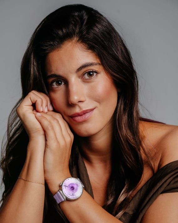 a closeup of a wrist adorned with a stylish watch