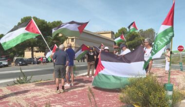 Dos personas identificadas en una protesta en solidaridad con Palestina durate el paso de La Vuelta por Navarra
