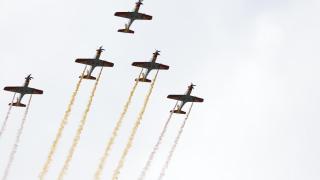 Formación 'Mirlo' dibujando la bandera nacional sobre Madrid