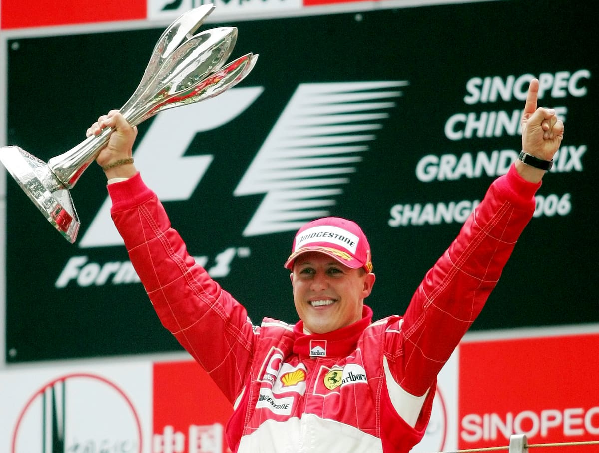 FILE - In this Oct. 1, 2006 file photo, Germany's Michael Schumacher celebrating winning the Formula One Chinese Grand Prix auto race at the Shanghai International Circuit in Shanghai, China. Schumacher's family, in a statement Wednesday, Jan. 2, 2019, has asked for understanding as it continues to keep details of his health private ahead of the seven-time Formula One champion's 50th birthday. Schumacher suffered serious head injuries in an accident while he was skiing with his teenage son Mick in the French Alps at Meribel on Dec. 29, 2013. (AP Photo/Greg Baker, File)