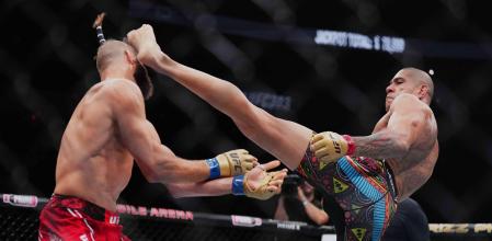 LAS VEGAS, NEVADA - JUNE 29: (R-L) Alex Pereira of Brazil kicks Jiri Prochazka of the Czech Republic in the UFC light heavyweight championship fight during the UFC 303 event at T-Mobile Arena on June 29, 2024 in Las Vegas, Nevada. (Photo by Chris Unger/Zuffa LLC via Getty Images)