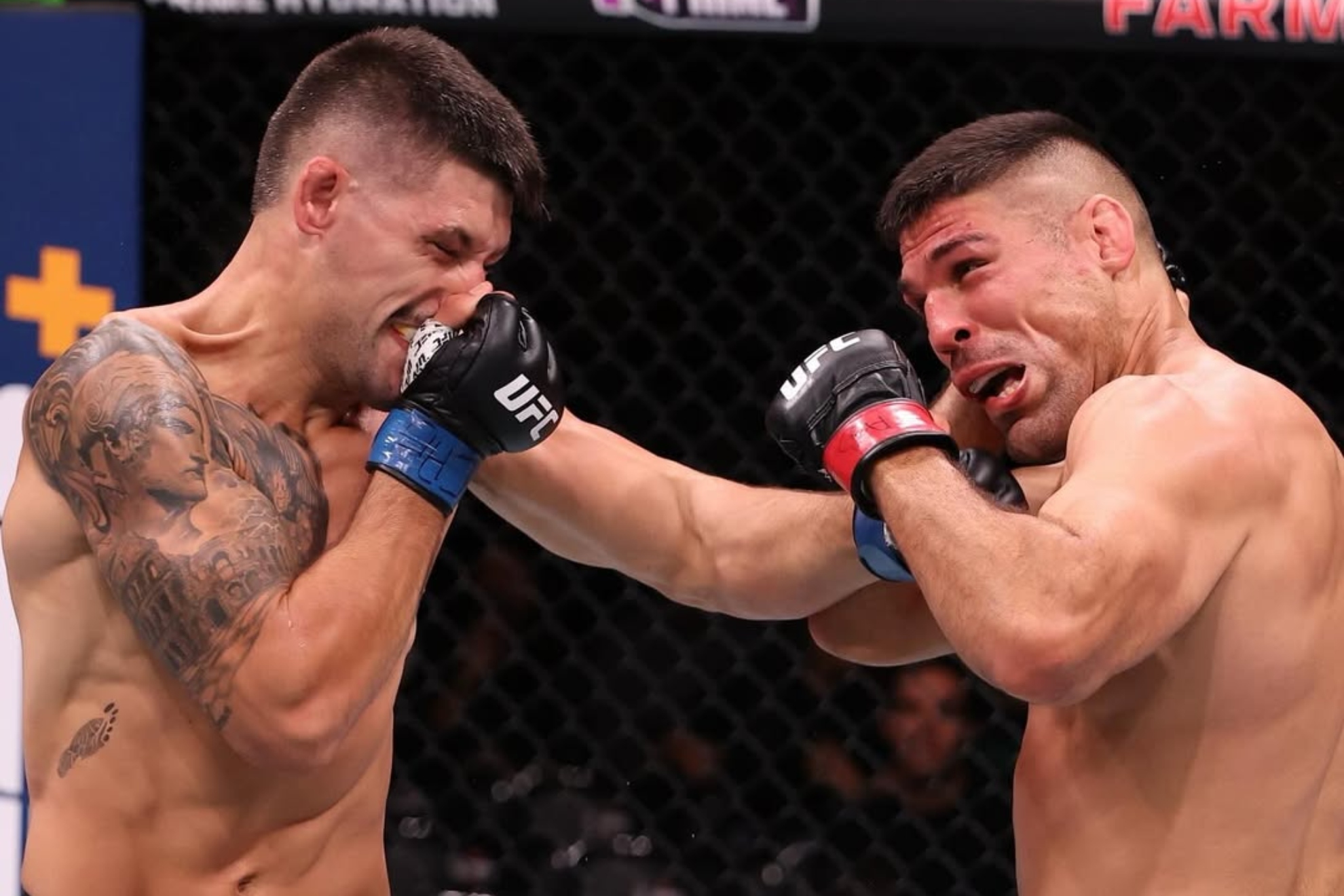 Joel Álvarez golpeando a Vicente Luque durante su combate.