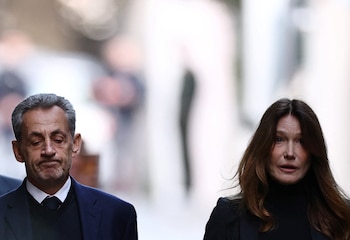 Nicolas Sarkozy y su esposa,