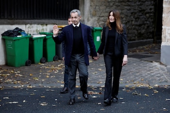 Nicolas Sarkozy y su esposa,