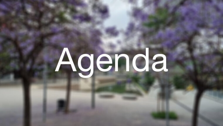 Imatge desenfocada amb la paraula "Agenda" en lletres blanques, en primer terme
