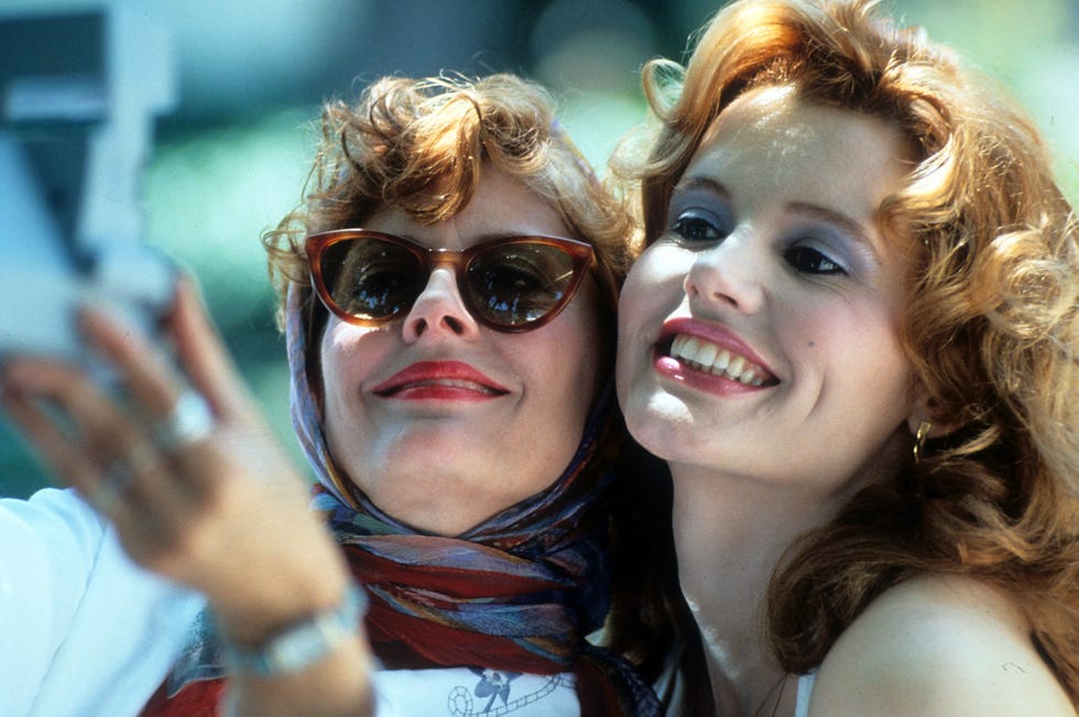 Susan Sarandon And Geena Davis In 'Thelma & Louise' susan sarandon and geena davis taking polaroid of themselves in a scene from the film thelma louise, 1991. (photo by metro goldwyn mayer/getty images)