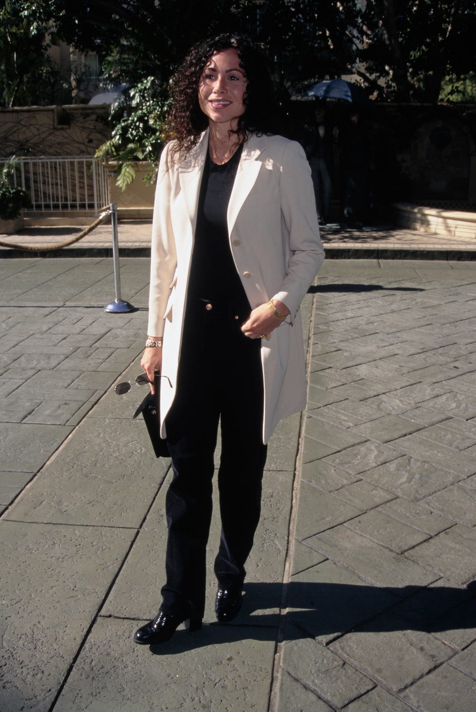 Premiere Magazine's 3rd Annual Women In Hollywood Awards Lunch british actress minnie driver, wearing a white coat over a black top with black trousers, during premiere magazines 3rd annual women in hollywood awards lunch, at four seasons hotel in beverly hills, california, 2nd december 1996. (photo by vinnie zuffante/getty images)