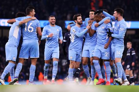 MANCHESTER, ENGLAND - NOVEMBER 28: Fernandinho of Manchester City celebrates after scoring their side's second goal with Bernardo Silva and Aymeric Laporte during the Premier League match between Manchester City and West Ham United at Etihad Stadium on November 28, 2021 in Manchester, England. (Photo by Naomi Baker/Getty Images)