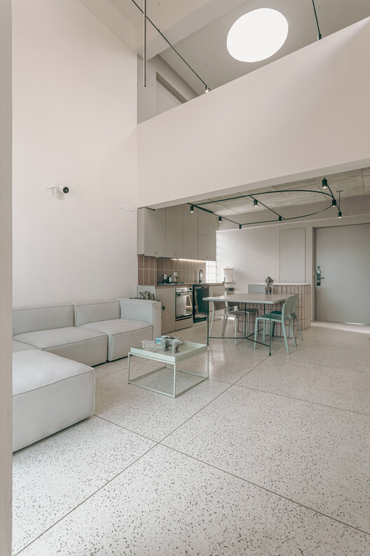 Edificio Residencial Hom / Dos Aguas Taller de Arquitectura - Fotografía interior, Iluminación, Sillas