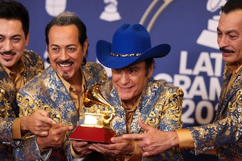 Los Tigres del Norte pose