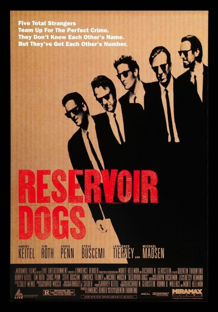 Tarantino y el afiche de su opera prima hoy cine de culto "Perros de la Calle", 1992