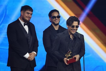 Christian Nodal accepts the award