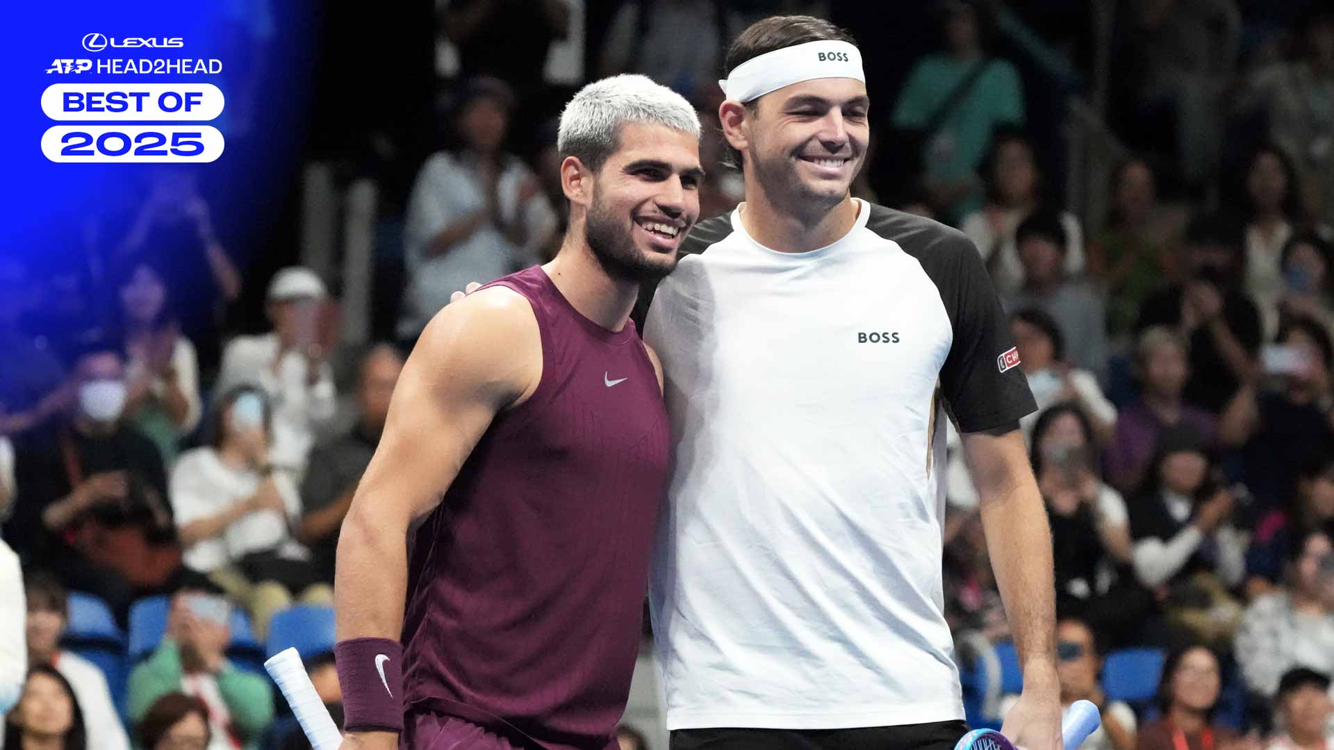 Carlos Alcaraz y Taylor Fritz posan antes de disputar la final de Tokio.