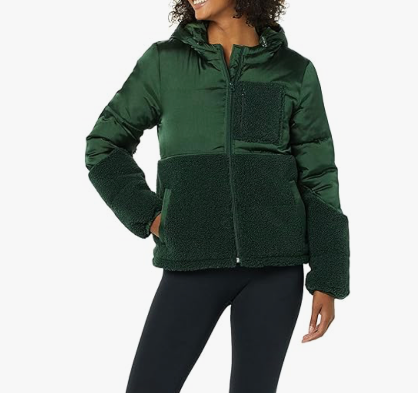 warm green jacket with a combination of shiny and plush materials featuring a hood and zip closure